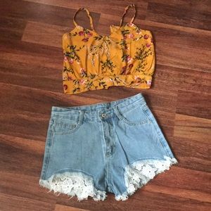 Contrast lace frayed denim shorts